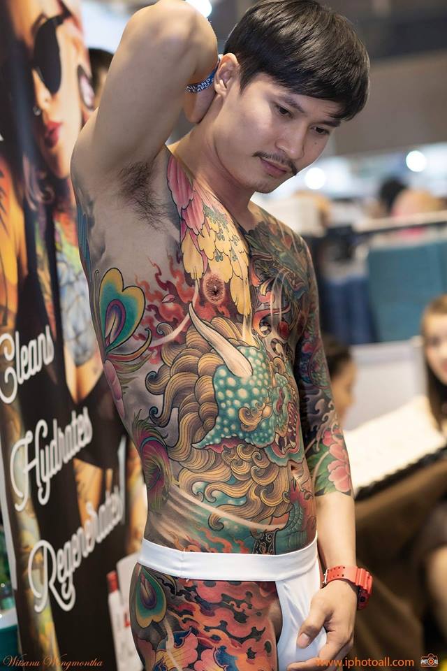 Tattooed thai lick dick outdoor