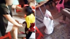 โหดโคตรเลว!!!!!!! หนูน้อยโดนจับใส่กระสอบแล้วตบตี แถมยืนถ่ายคลิป ไม่คิดช่วยเหลือ !!