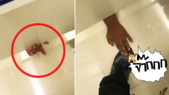 หนุ่มเข้าห้องน้ำในห้างหรู เจอมือปริศนาสอดมาพร้อมทำมือแบบนี้!!