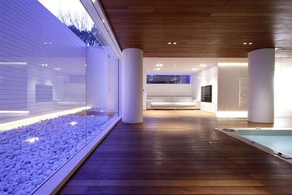 Luxury Indoor Pool House Design by JM Architecture