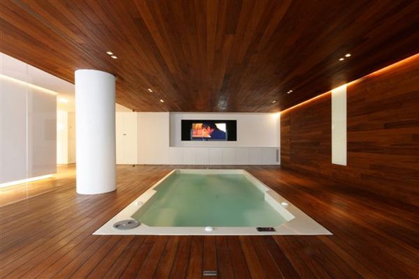 Luxury Indoor Pool House Design by JM Architecture
