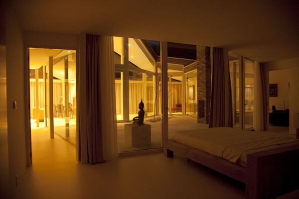 Center Courtyard Home Plans - Timeless Ranch Design with Glass Facade