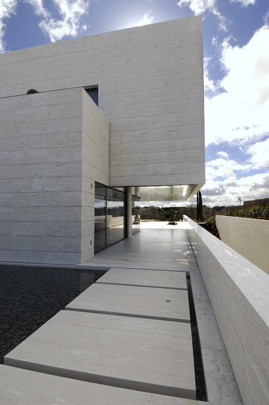 Amazing Travertine House by A-Cero Architecture Firm with water features