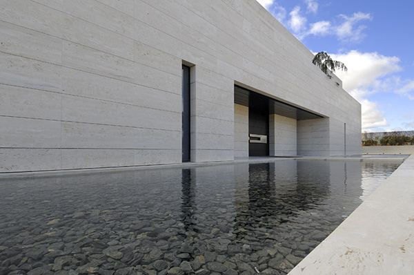 Amazing Travertine House by A-Cero Architecture Firm with water features