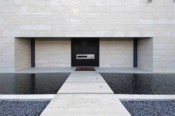 Amazing Travertine House by A-Cero Architecture Firm with water features