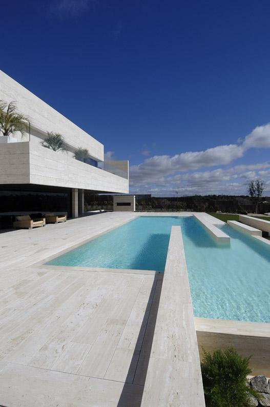 Amazing Travertine House by A-Cero Architecture Firm with water features