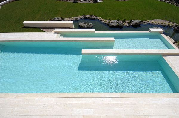 Amazing Travertine House by A-Cero Architecture Firm with water features