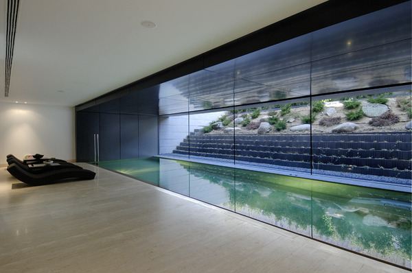 Amazing Travertine House by A-Cero Architecture Firm with water features