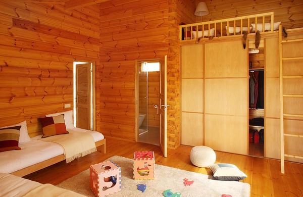 Laminated Pinewood House by Nordicasa Design & Construction. We love it!