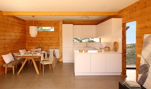 Laminated Pinewood House by Nordicasa Design & Construction. We love it!