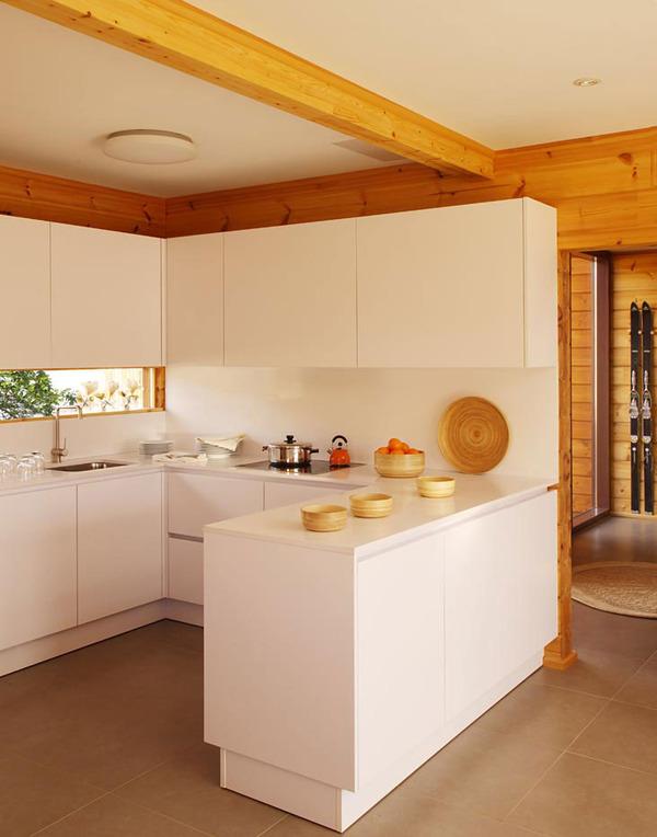 Laminated Pinewood House by Nordicasa Design & Construction. We love it!