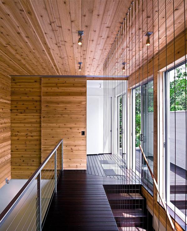 Riverfront Home Plan with a Modern Lofty Interior