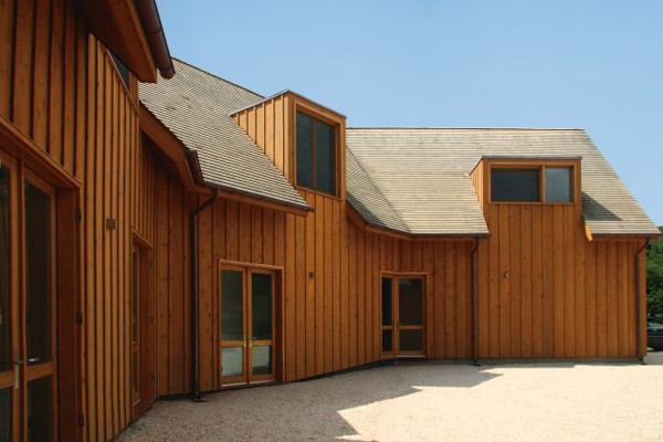 Wood Country Home with a Centrifugal Layout in New York