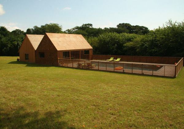 Wood Country Home with a Centrifugal Layout in New York