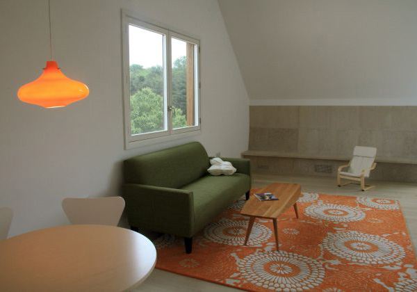 Wood Country Home with a Centrifugal Layout in New York