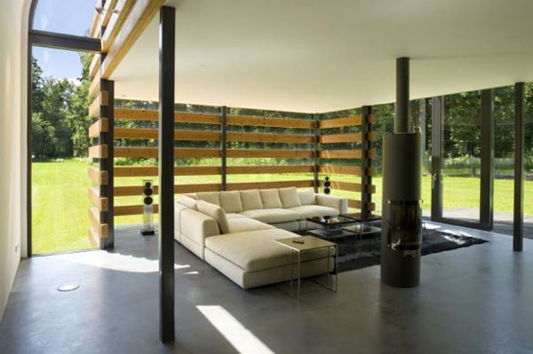 Metal Roof Houses - curved steel roof home by Dutch architects