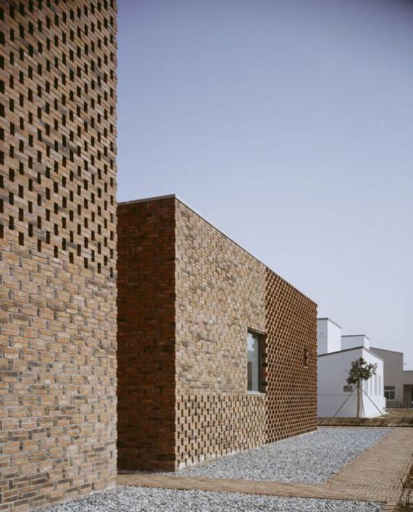 Modern Brick Home Design in China brings an innovative twist to tradition