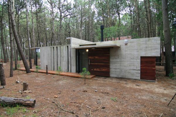 Vacation House Design - rustic concrete cottage built for minimal maintenance