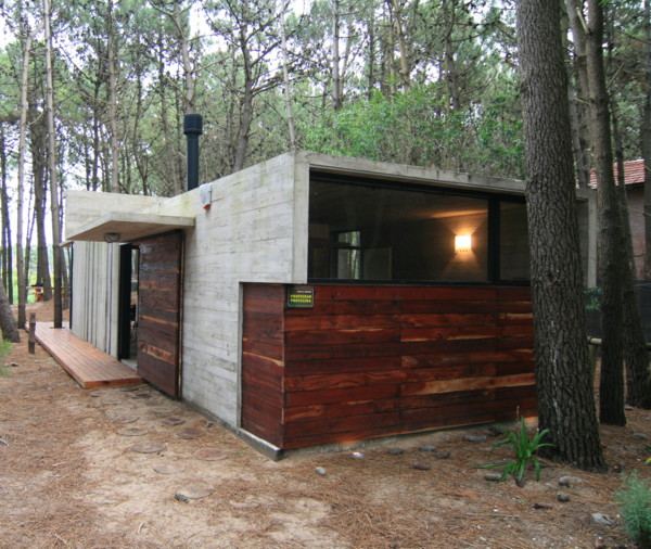 Vacation House Design - rustic concrete cottage built for minimal maintenance