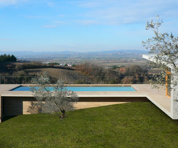 Sandstone House Design - a European style house overlooking Italian countryside