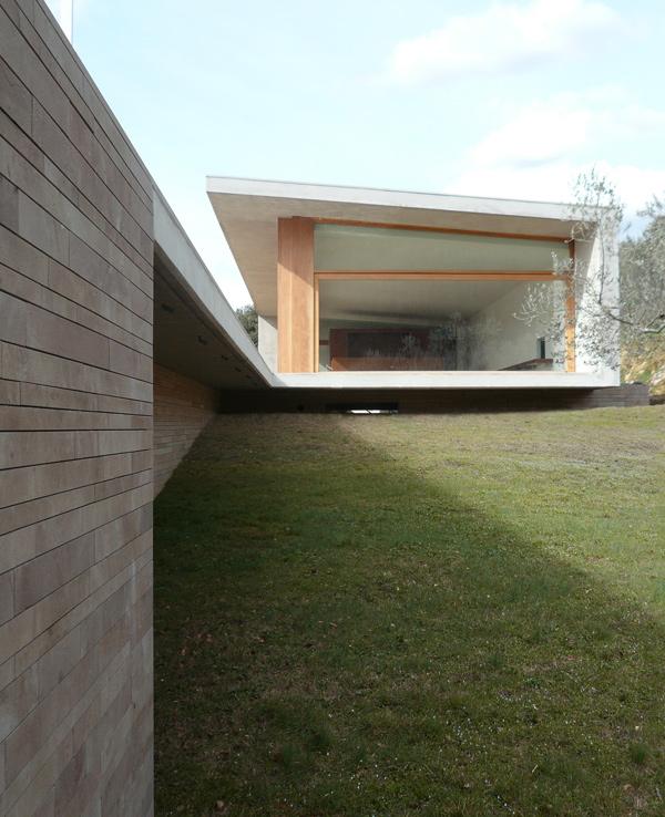 Sandstone House Design - a European style house overlooking Italian countryside