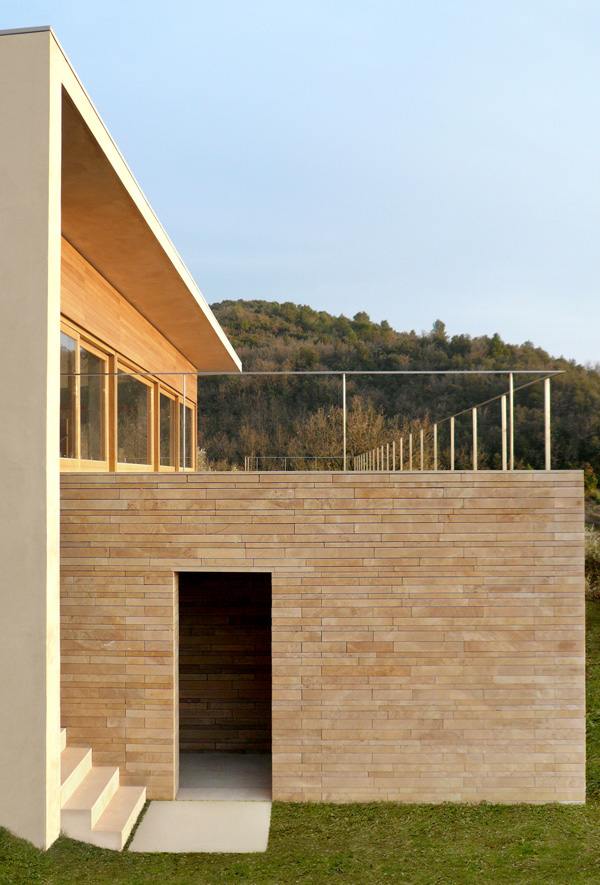 Sandstone House Design - a European style house overlooking Italian countryside