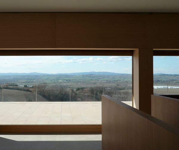 Sandstone House Design - a European style house overlooking Italian countryside