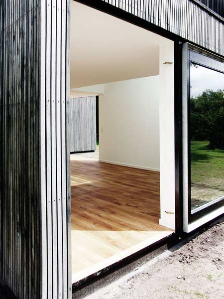 Simple Small House Design in Denmark offers plenty of space and light