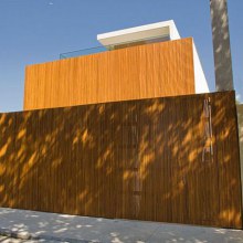 Innovative Brazilian Architecture - concrete house with folded wood walls