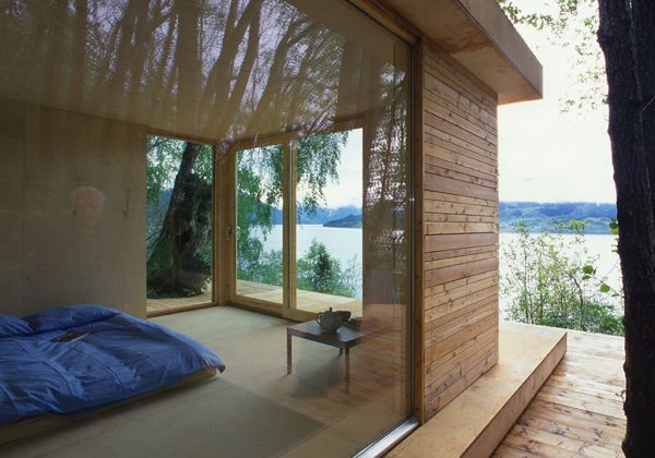 Lake House Architecture with Modern Wraparound Roof