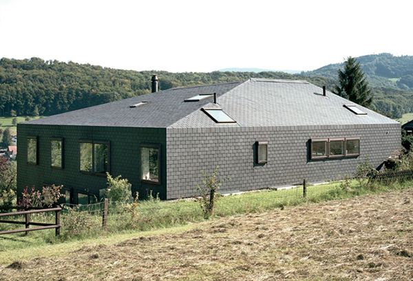 Horizontal House in Switzerland with Interior Courtyard