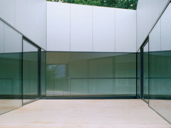 Horizontal House in Switzerland with Interior Courtyard