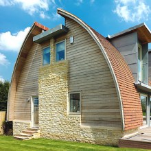 Curved Roof House Plan makes a Stylish Eco Statement