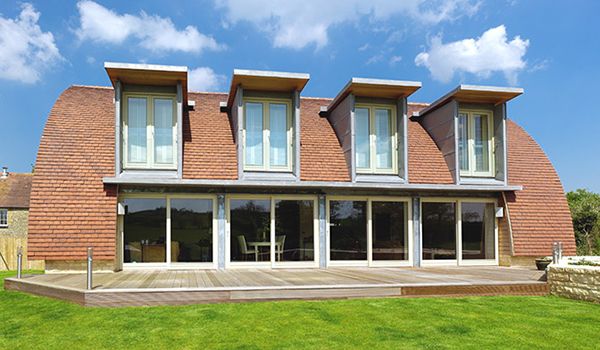 Curved Roof House Plan makes a Stylish Eco Statement