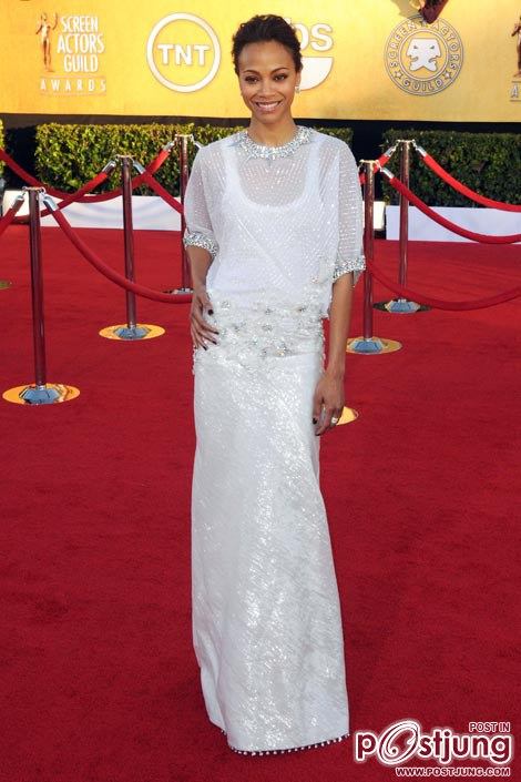 Zoe Saldana wears a Givenchy Haute Couture dress,