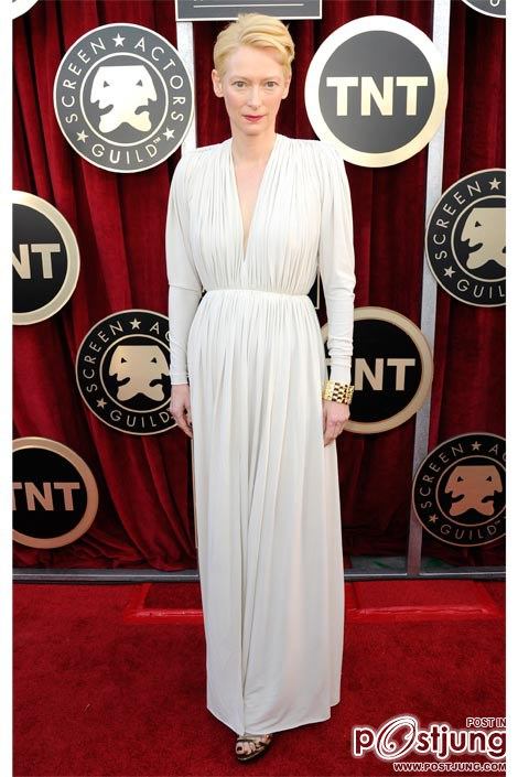 Tilda Swinton wears a Lanvin dress and shoes, and