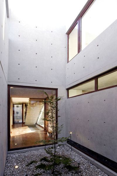 Concrete Home Architecture Decorated with ... Sunlight