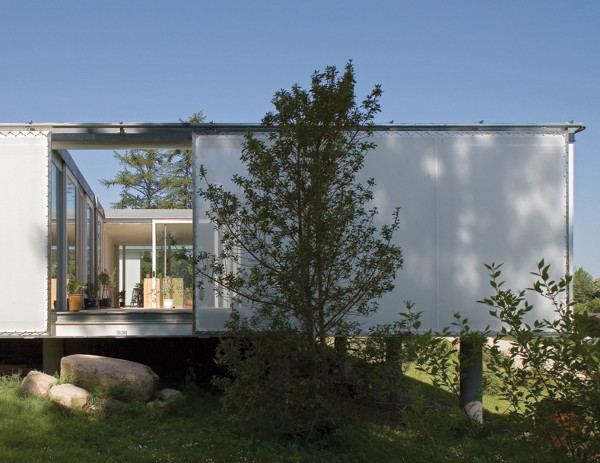 Unusual Summer House hides behind fabric panels