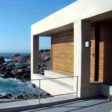 Contemporary Coastal Homes on a rocky shore of Punta Pite, Chile