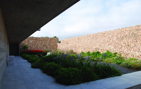 Coastal Home Design has it all: ocean views, beach and hidden garden!