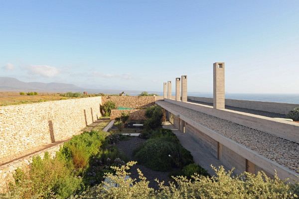 Coastal Home Design has it all: ocean views, beach and hidden garden!