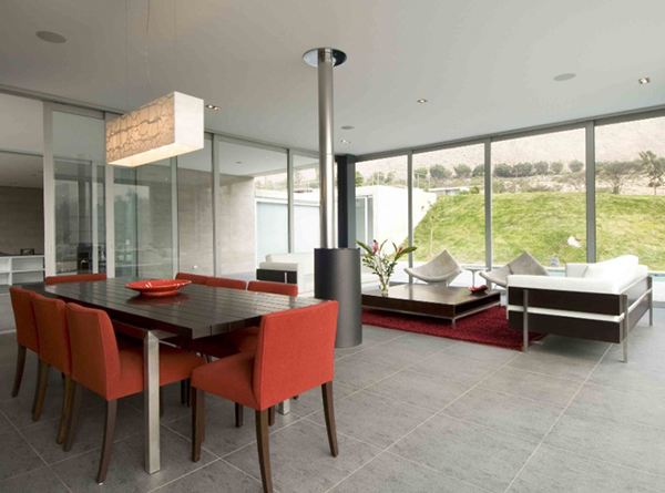 Concrete and Glass Home blends with the Andes