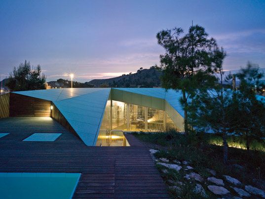 Sustainable House in Spain - unusual design in concrete, glass and timber