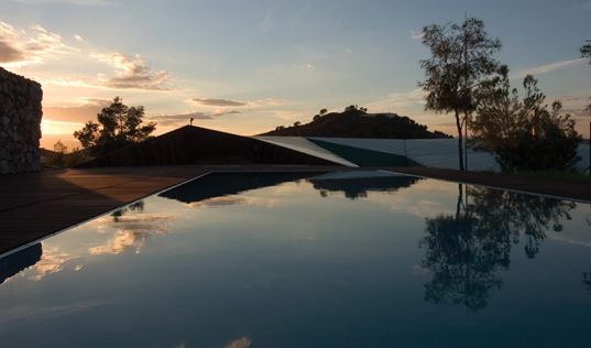 Sustainable House in Spain - unusual design in concrete, glass and timber