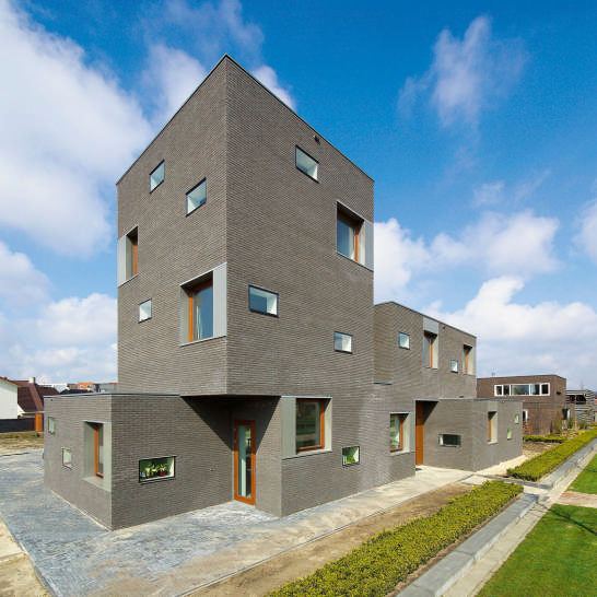 Brick House Design in Netherlands - asymmetrical, with two faces