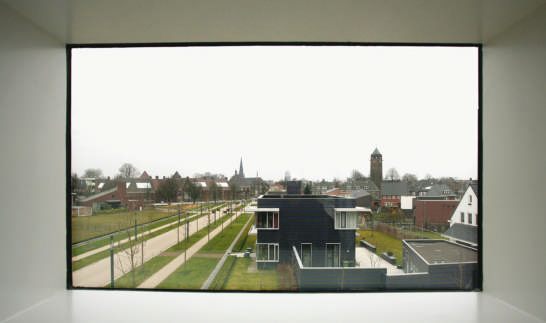 Brick House Design in Netherlands - asymmetrical, with two faces