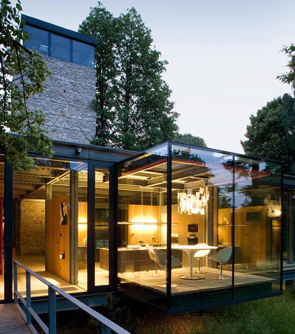 Modern Glass Home in Krakow, Poland comes with a tree and a tower!