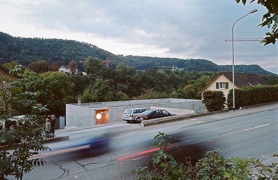 Concrete Prefab House - contemporary design in Switzerland, filled with popular modern furniture