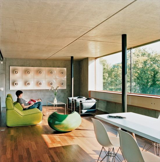 Concrete Prefab House - contemporary design in Switzerland, filled with popular modern furniture