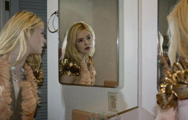 A MAGAZINE: ELLE FANNING IN "RODARTE" BY PHOTOGRAPHER BILL OWENS